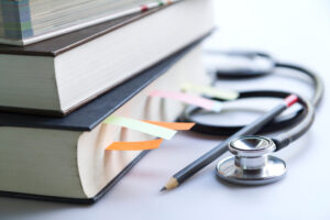 Medical,Student,Textbooks,With,Pencil,And,Multicolor,Bookmarks,And,Stethoscope